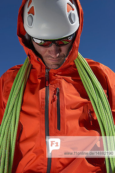 Mountaineer with climbing ropes