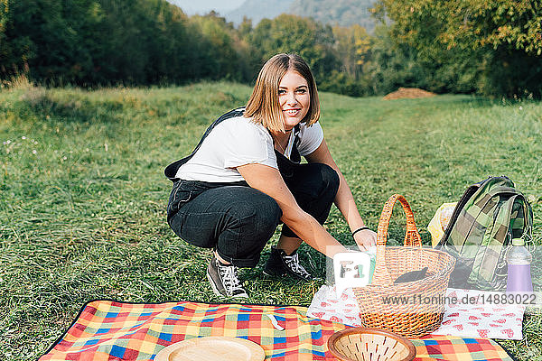 Woman having picnic  Rezzago  Lombardy  Italy