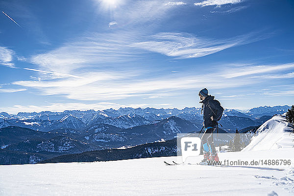 Germany  Bavaria  Brauneck  man on a ski tour in winter in the mountains