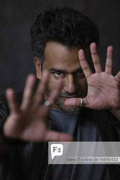 Portrait of an Indian magician  gesturing