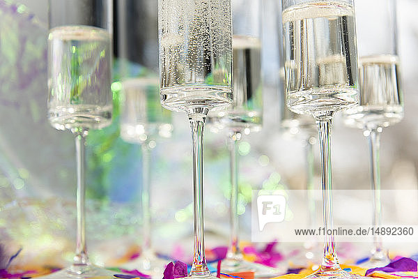 Champagne glasses with confetti