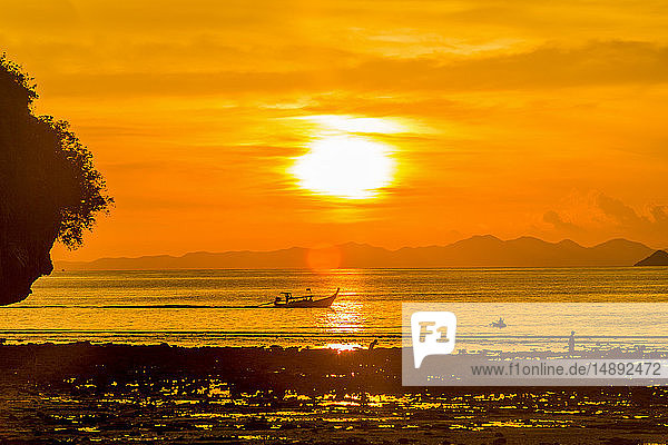 Silhouette of boat at sunset in West Railay  Thailand
