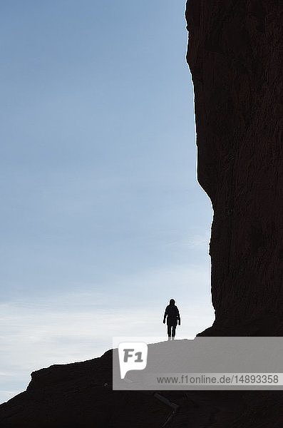 Woman's silhouette by Fisher Towers in Utah  USA