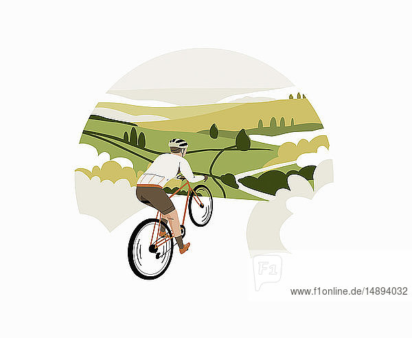 Radfahrer fährt mit dem Fahrrad durch die Landschaft