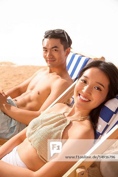 Romantic young lovers on the beach