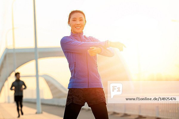 Outdoor fitness young woman