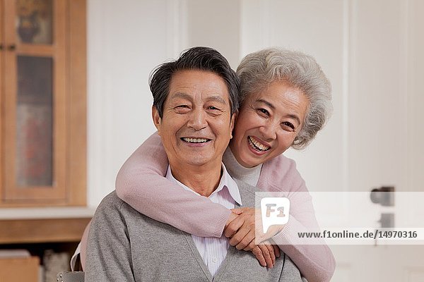 Portrait of loving old couple  Chinese ethnicity