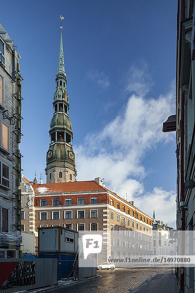 Winter morning in Riga old town  Latvia. St Peter's church tower in the distance.