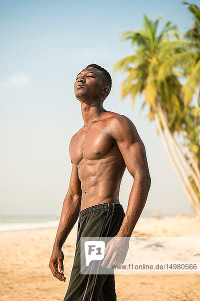 Muscular man on beach