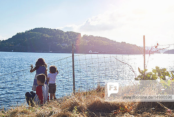 Children looking out to lake