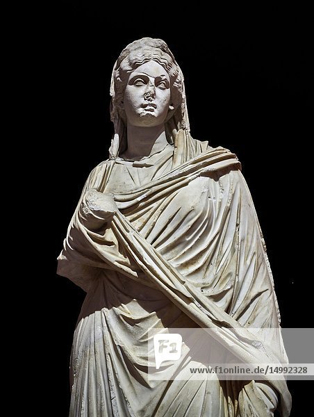 Roman statue of Sabina. Marble. Perge. 2nd century AD. Inv no 3066-3086. Antalya Archaeology Museum  Turkey. Against a black background.