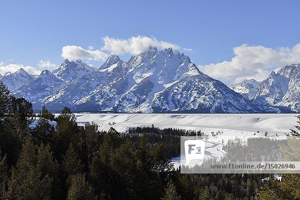 Snmow covered Teton Range and Snake River on a nice winter day from Snake River Overlook  Grand Teton NP  Wyoming  USA.