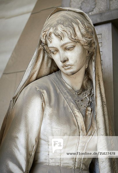 Picture and image of the stone sculpture of 2 mourning sisters at the door of their mothers pyramid shaped tomb  The Rossi Tomb sculpted by G Benetti in 1878. Section D  no 24  The monumental tombs of the Staglieno Monumental Cemetery  Genoa  Italy.