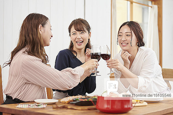 Japanese women having home party