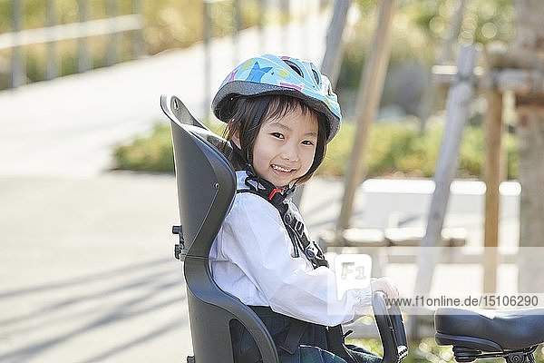 Japanese kid on a bike