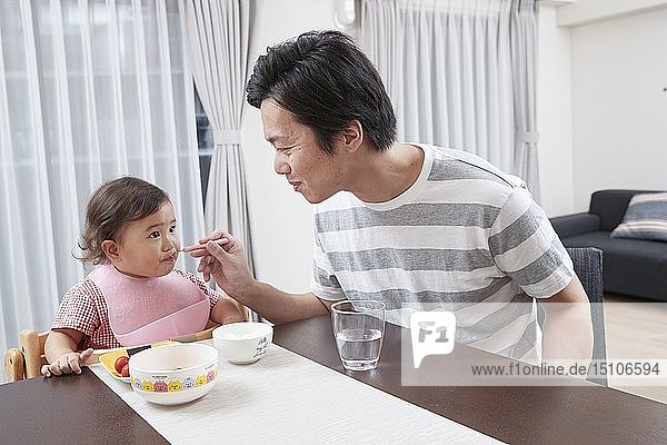 Japanese kid with father at home