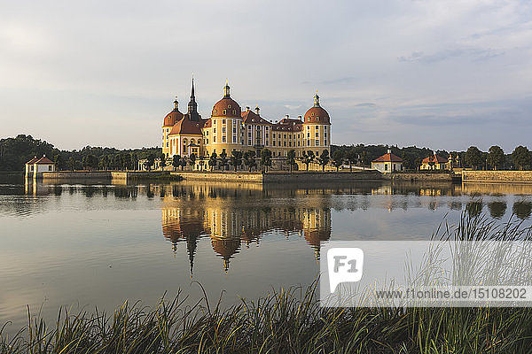 Germany  Saxony  Moritzburg Castle at castle pond in the evening
