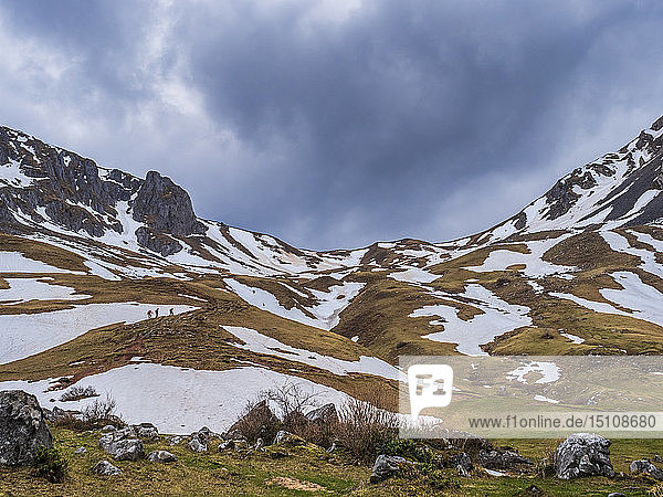 Spain Asturias Tuiza de Arriba Cantabrian Mountains people on their way to Pena Ubina