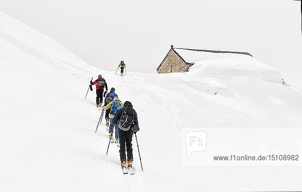 Georgia  Caucasus  Gudauri  people on a ski tour to Lomisi Monastery