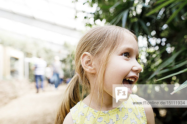 Portrait of happy girl outdoors