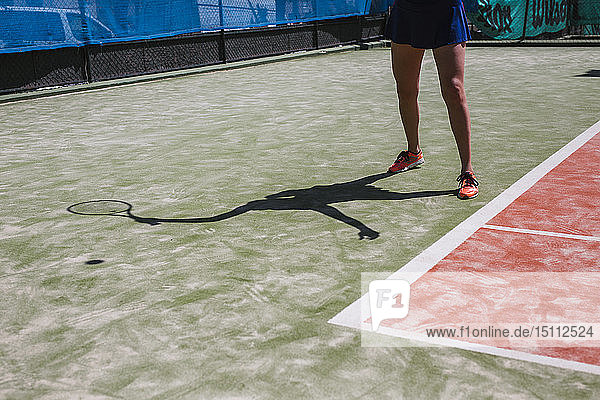 Close-up of female tennis player on court