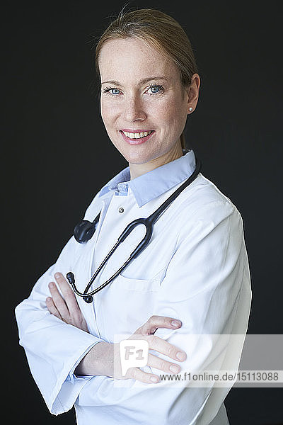 Portrait of confident female doctor