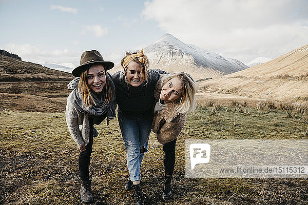 UK  Scotland  Loch Lomond and the Trossachs National Park  happy female friends in rural landscape