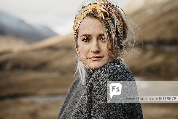 UK  Scotland  Loch Lomond and the Trossachs National Park  portrait of young woman in rural landscape