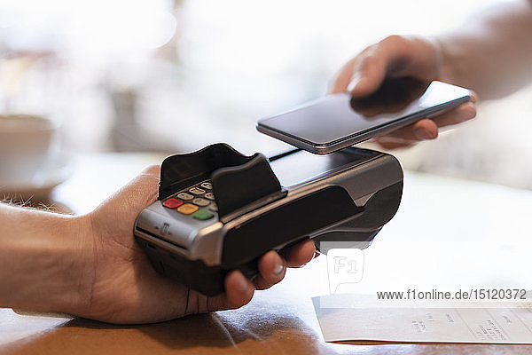 Contactless payment with smartphone  close-up