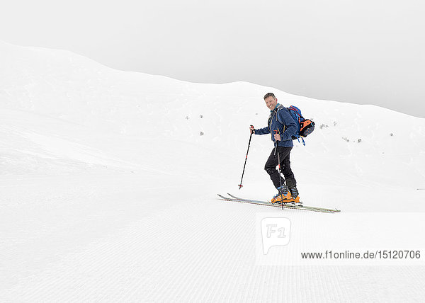 Georgia  Caucasus  Gudauri  confident man on a ski tour