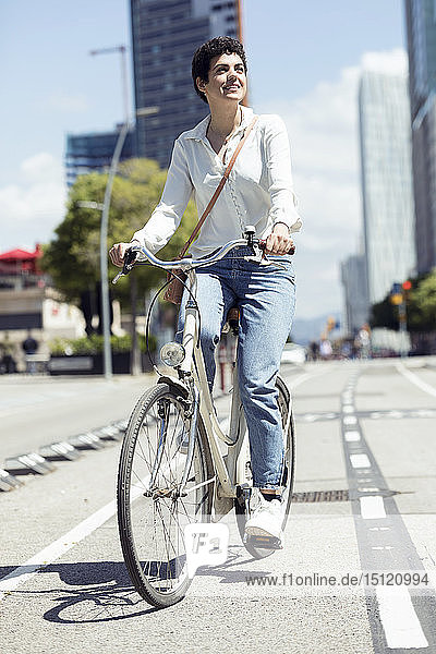 Woman with bike on bicycle lane