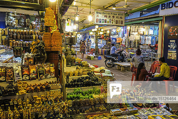 Stalls of tourist souvenirs in the Art Center Night Market in the centre of this important NW tourist town  Siem Reap  Cambodia  Indochina  Southeast Asia  Asia