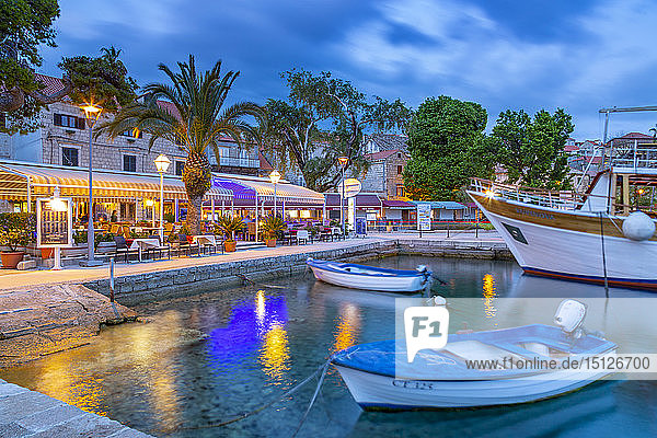 View of restaurants and harbour boats at dusk  Cavtat on the Adriatic Sea  Cavtat  Dubrovnik Riviera  Croatia  Europe
