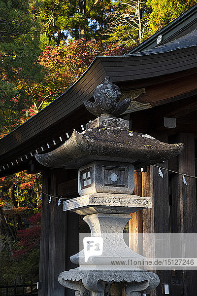 A stone lantern near the Sakurayamu Hachiman-gu Shrine in Takayama Japan Asia