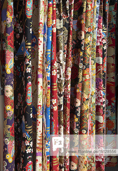 Colourful Japanese fabrics for sale at the Hida Takayama Miyagawa morning market in Takayama Japan Asia