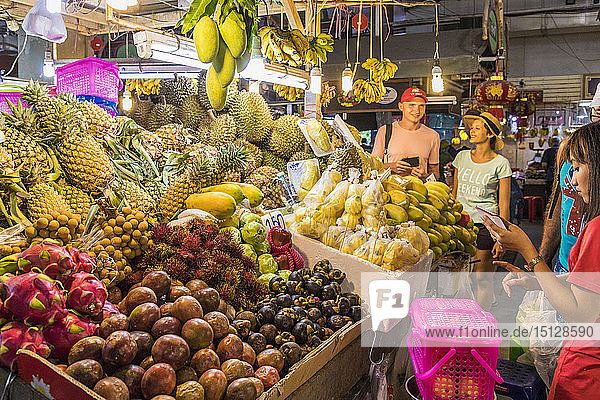 A fruit stall at the indoor Banzaan food market in Patong  Phuket  Thailand  Southeast Asia  Asia