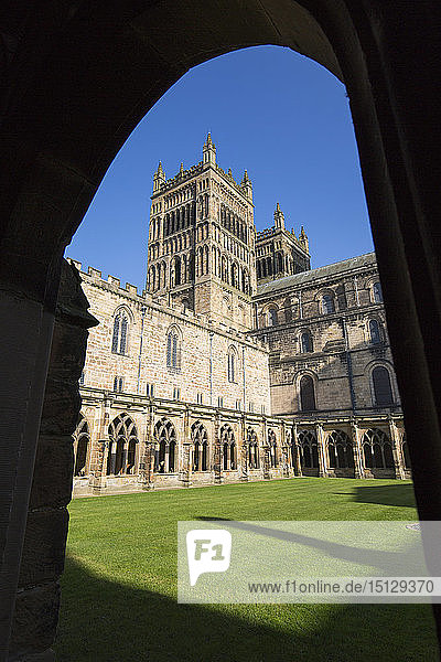 View across cloister lawn to the twin western towers of Durham Cathedral  Durham  County Durham  England  United Kingdom  Europe
