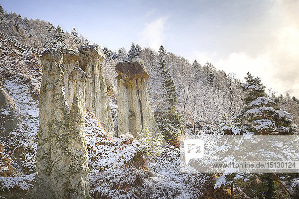 Hoodoos of Postalesio after a snowfall Postalesio Valtellina Lombardy Italy Europe