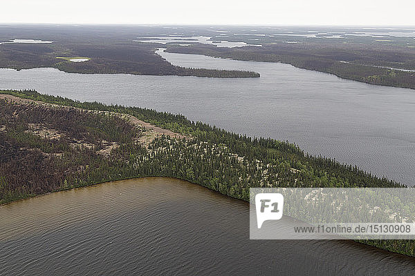 Aerial photography of an esker a sandy ridge formed by subglacial deposits of sediment in the last Ice Age in Manitoba Canada North America
