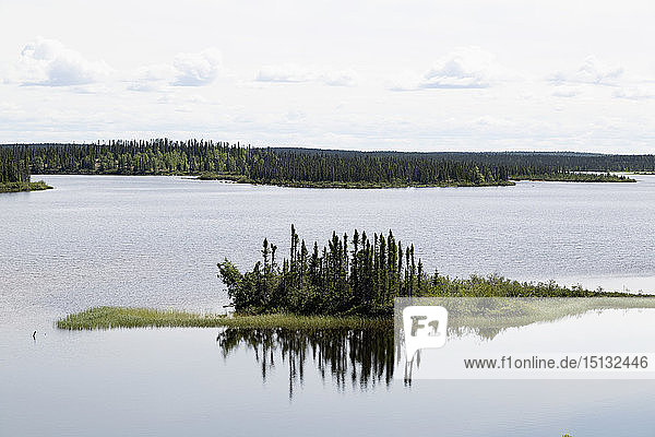 Island in Dillabough Lake in northern Manitoba Canada North America
