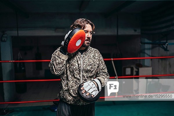 Trainer in boxing ring