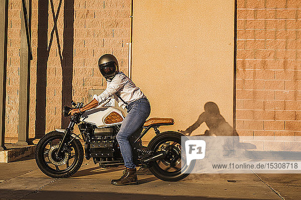 Man demonstrating his motorbike