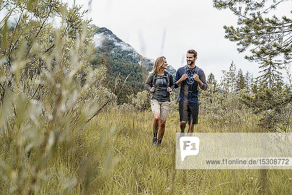 Young couple on a hiking trip  Vorderriss  Bavaria  Germany