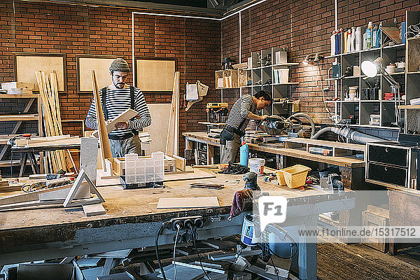 Carpenters at work  wooden table