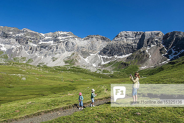 Pyrenees National Park  Hautes-Pyrenees  family in the Cirque de Troumouse (UNESCO World Heritage)