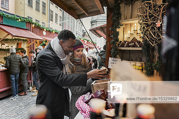 Couple shopping at market