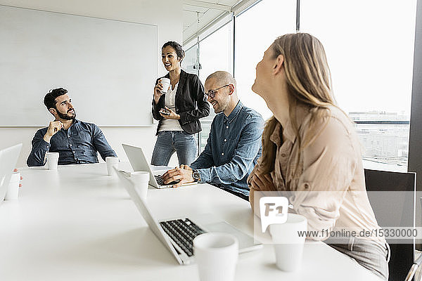 Businesspeople during meeting in conference room