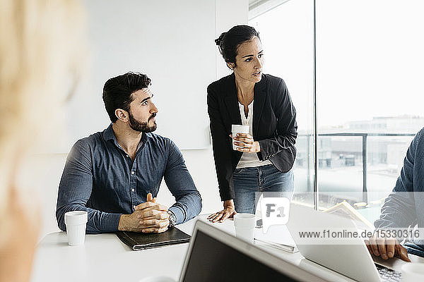Businesspeople during meeting in conference room