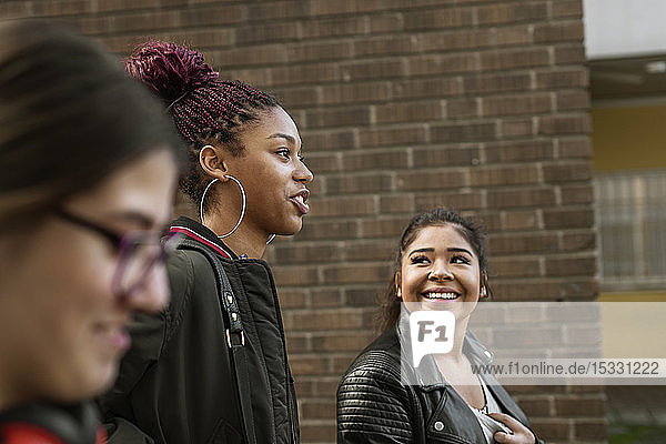 Teenage girls smiling