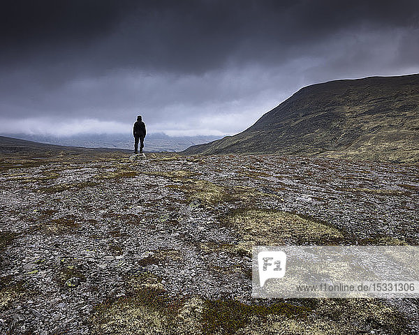 Man standing in Rondane National Park Norway